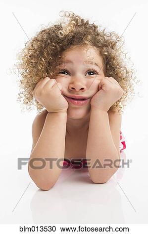 Stock Image - Bored mixed race girl. Fotosearch