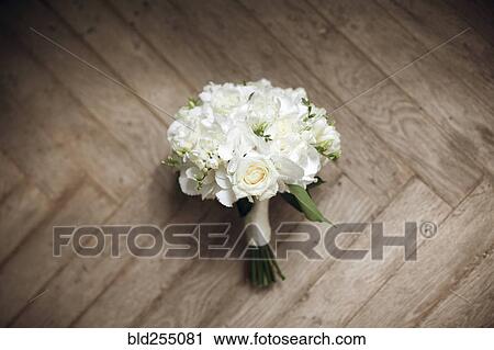 Bouquet of white roses on floor View Large Photo Image Stock Image - Bouquet of white roses on floor. Fotosearch