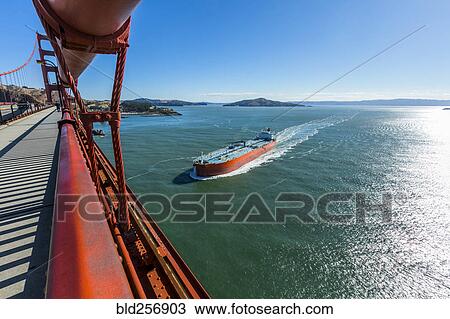 Bridge over boat in bay View Large Photo Image Stock Image - Bridge over boat in bay. Fotosearch