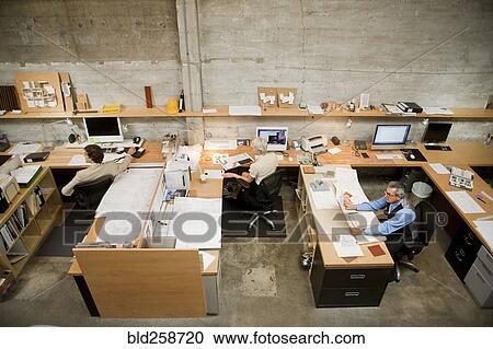 Business people working in busy office View Large Photo Image Stock Image - Business people working in busy office. Fotosearch