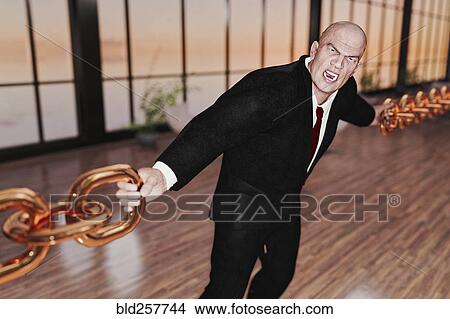 Businessman linking gold chains View Large Photo Image Picture - Businessman linking gold chains. Fotosearch