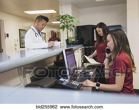 Busy nurses and doctor in hospital View Large Photo Image Stock Image - Busy nurses and doctor in hospital. Fotosearch