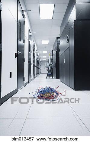 Stock Photo - Cables on floor of server room. Fotosearch