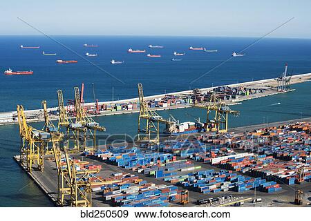 Stock Photo - Cargo containers and ships at port. Fotosearch