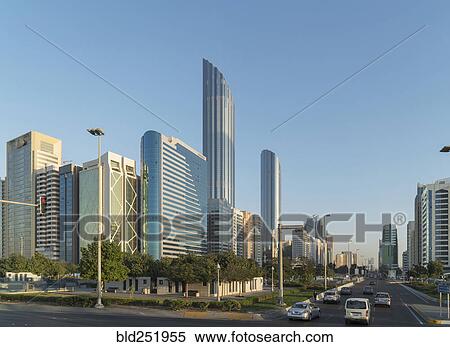 Cars driving in city street View Large Photo Image Stock Photography - Cars driving in city street. Fotosearch