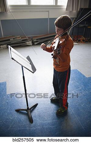 Caucasian boy 1acticing violin View Large Photo Image Stock Photography - Caucasian boy 1acticing violin. Fotosearch