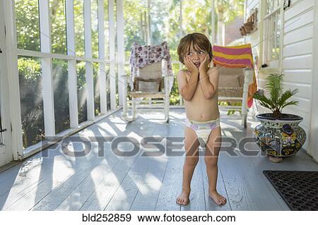 Caucasian boy on the porch wearing a diaper View Large Photo Image Stock Photo - Caucasian boy on the porch wearing a diaper. Fotosearch