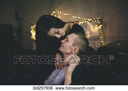 Stock Photograph - Caucasian couple embracing. Fotosearch