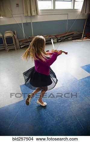 Caucasian girl 1acticing violin and dancing View Large Photo Image Picture - Caucasian girl 1acticing violin and dancing. Fotosearch