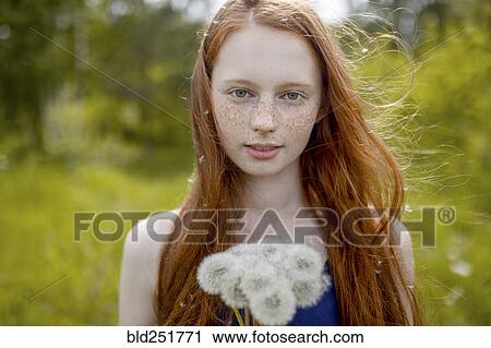 Caucasian girl with dandelion seeds hair View Large Photo Image Stock Image - Caucasian girl with dandelion seeds hair. Fotosearch