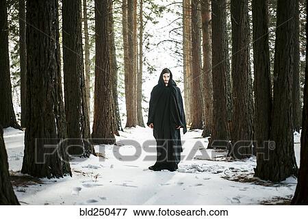 Caucasian man with beard wearing robe in forest during winter View Large Photo Image Stock Photo - Caucasian man with beard wearing robe in forest during winter. Fotosearch
