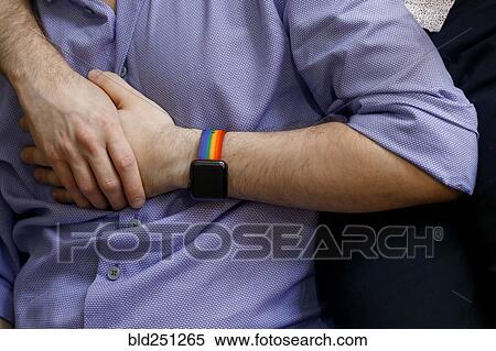 Stock Photography - Caucasian men holding hands. Fotosearch