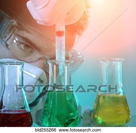 Caucasian scientist experimenting with multicolor liquids View Large Photo Image Stock Photograph - Caucasian scientist experimenting with multicolor liquids. Fotosearch