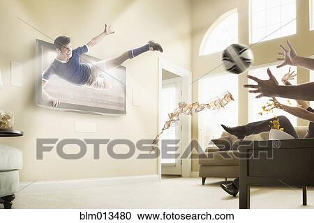 Caucasian soccer player coming out of television set View Large Photo Image Stock Image - Caucasian soccer player coming out of television set. Fotosearch