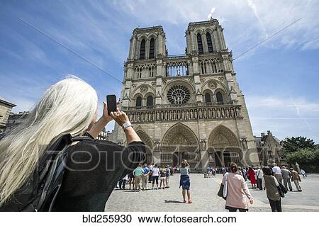 "Caucasian woman photographing building, Paris, Ile de France, France" View Large Photo Image Stock Image - "Caucasian woman photographing building, Paris, Ile de France, France". Fotosearch