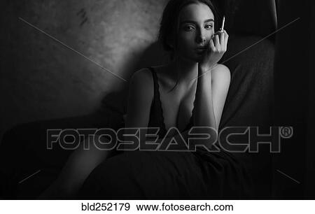 Caucasian woman smoking cigarette View Large Photo Image Stock Photo - Caucasian woman smoking cigarette. Fotosearch