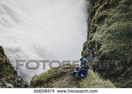 Caucasian woman watching waterfall View Large Photo Image Picture - Caucasian woman watching waterfall. Fotosearch