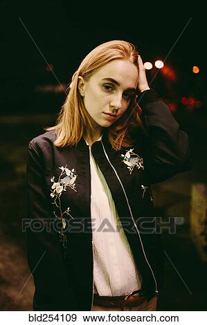 Caucasian woman wearing floral jacket View Large Photo Image Stock Photo - Caucasian woman wearing floral jacket. Fotosearch