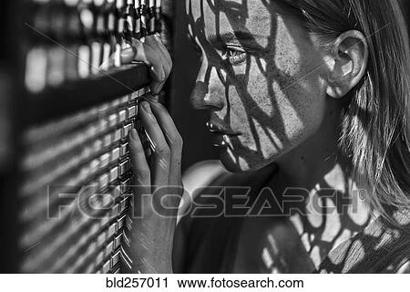 Caucasian woman with freckles leaning on window View Large Photo Image Stock Image - Caucasian woman with freckles leaning on window. Fotosearch