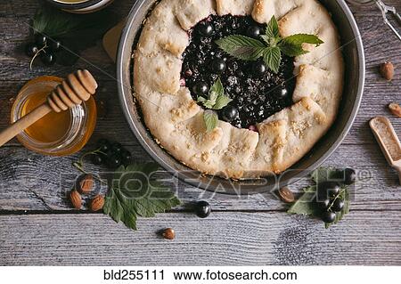 Stock Image - Close up of blackcurrant pie. Fotosearch
