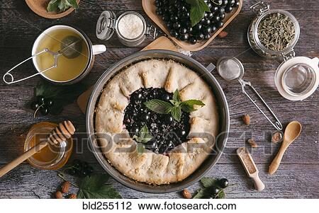 Stock Image - Close up of blackcurrant pie. Fotosearch