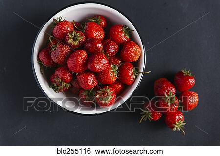 Close up of bowl of strawberries View Large Photo Image Stock Photograph - Close up of bowl of strawberries. Fotosearch