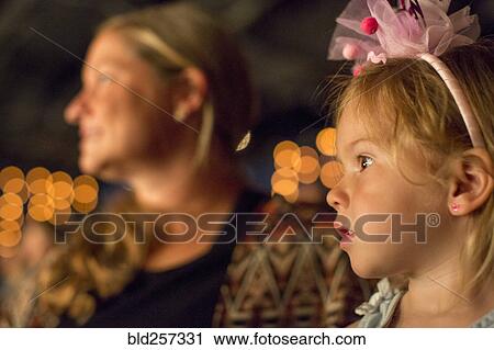 Stock Image - Close up of Caucasian girl looking away. Fotosearch