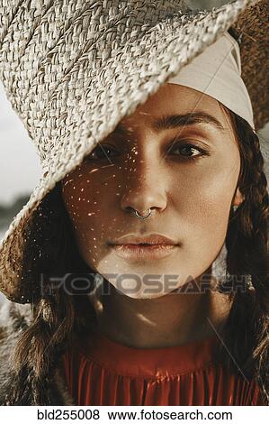 Stock Photo - Close up of Caucasian woman with nose ring. Fotosearch