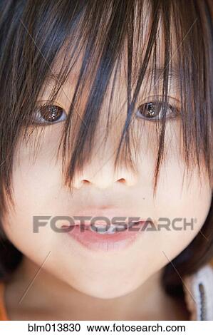 Stock Image - Close up of Chinese boy. Fotosearch