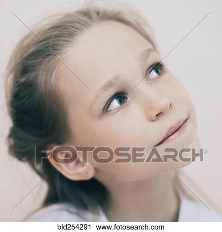 Close up of curious Caucasian girl View Large Photo Image Stock Image - Close up of curious Caucasian girl. Fotosearch