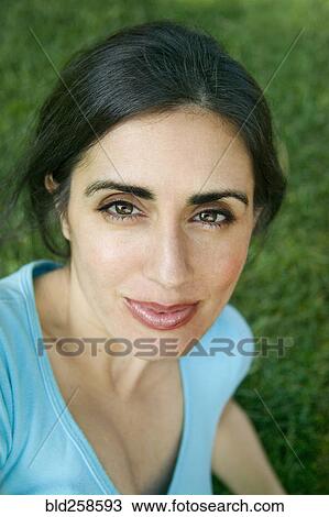 Close up of face of smiling mixed race woman View Large Photo Image Stock Image - Close up of face of smiling mixed race woman. Fotosearch