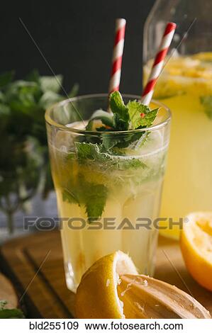 Close up of fresh lemonade in glass View Large Photo Image Stock Photo - Close up of fresh lemonade in glass. Fotosearch