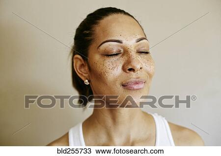Close up of mixed race woman with eyes closed View Large Photo Image Stock Image - Close up of mixed race woman with eyes closed. Fotosearch