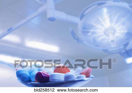 Close up of pharmaceutical pills in spoon View Large Photo Image Stock Image - Close up of pharmaceutical pills in spoon. Fotosearch