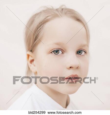 Stock Photo - Close up of serious Caucasian girl. Fotosearch
