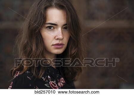 Stock Image - Close up of serious Caucasian woman. Fotosearch