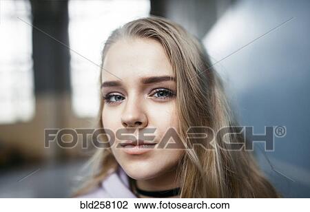 Stock Image - Close up of serious Caucasian woman. Fotosearch