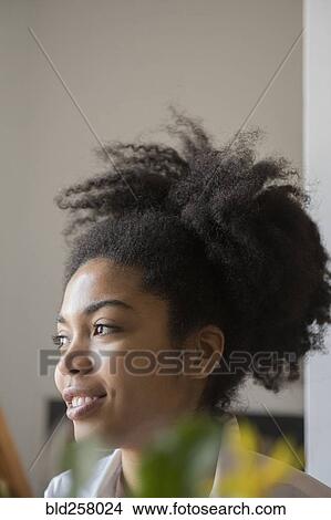 Close up of smiling African American woman View Large Photo Image Picture - Close up of smiling African American woman. Fotosearch