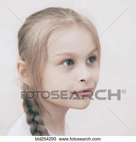 Stock Image - Close up of smiling Caucasian girl. Fotosearch
