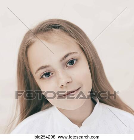 Stock Photo - Close up of smiling Caucasian girl. Fotosearch