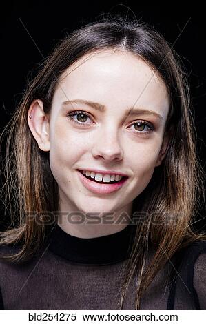 Stock Photography - Close up of smiling Caucasian woman. Fotosearch