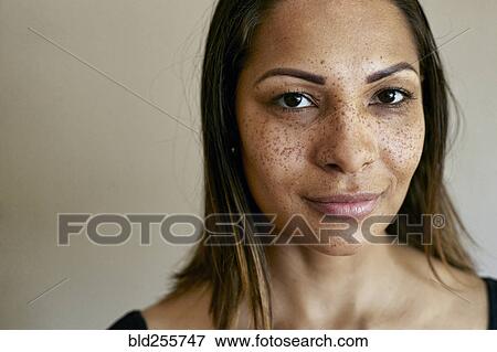 Close up of smiling mixed race woman View Large Photo Image Stock Photo - Close up of smiling mixed race woman. Fotosearch