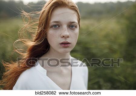 Close up of wind blowing hair of Caucasian woman View Large Photo Image Stock Image - Close up of wind blowing hair of Caucasian woman. Fotosearch