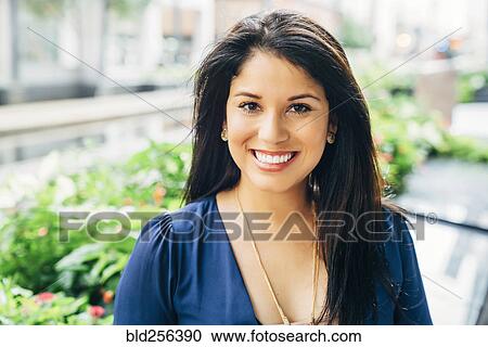 Close up portrait of smiling Hispanic woman View Large Photo Image Stock Image - Close up portrait of smiling Hispanic woman. Fotosearch
