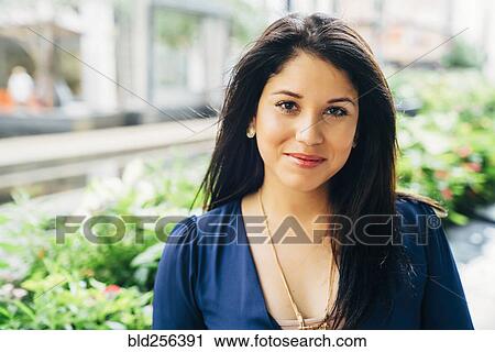 Close up portrait of smiling Hispanic woman View Large Photo Image Stock Image - Close up portrait of smiling Hispanic woman. Fotosearch