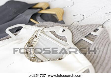 Clothing on bed View Large Photo Image Stock Photo - Clothing on bed. Fotosearch