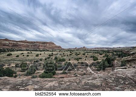 "Clouds over desert in Moab, Utah, United States" View Large Photo Image Picture - "Clouds over desert in Moab, Utah, United States". Fotosearch