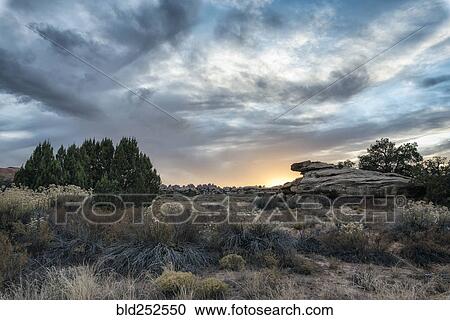 "Clouds over desert in Moab, Utah, United States" View Large Photo Image Stock Image - "Clouds over desert in Moab, Utah, United States". Fotosearch