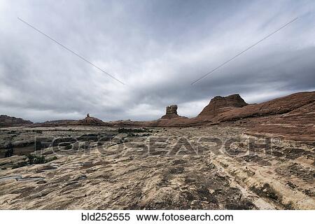 Stock Photography - "Clouds over desert in Moab, Utah, United States". Fotosearch