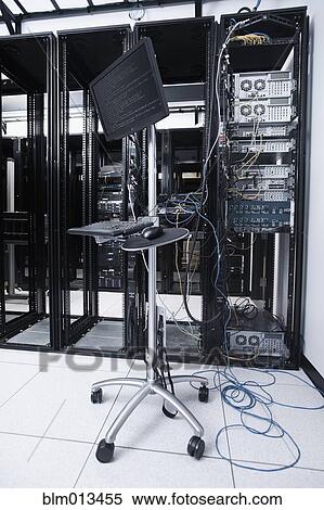 Stock Photography - Computer and keyboard in server room. Fotosearch